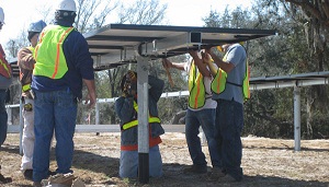 Solar being installed on a single-axis tracker
