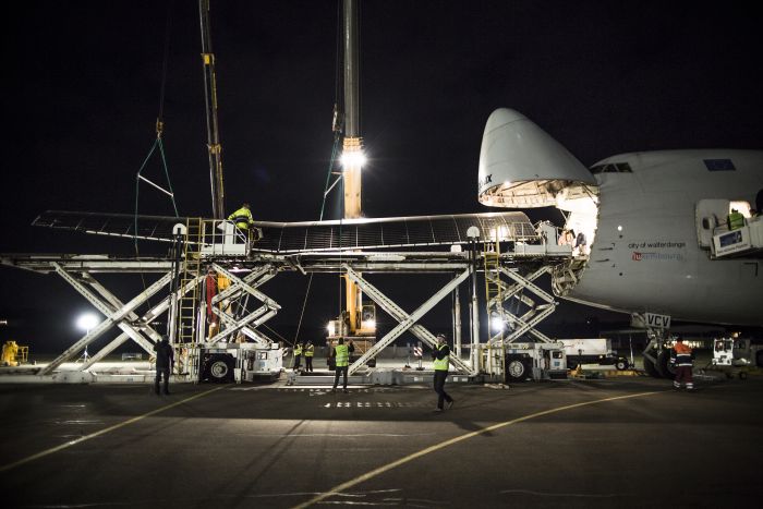 Solar Impulse's HB-SIA is loaded onto a 747 for transport