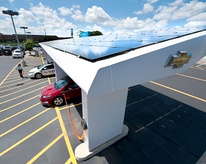 GM offers dealerships Green Zones—EV solar chargers