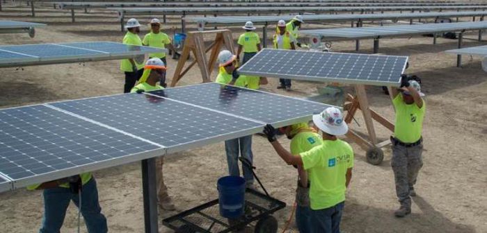 The final panel being installed at the California Valley Solar Ranch. Courtesy SunPower.