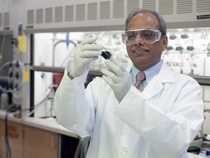 Purdue's Rakesh Agrawal holding a bit of the solar ink