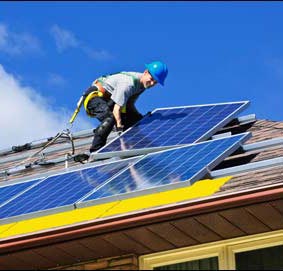 Installing solar on a roof. 