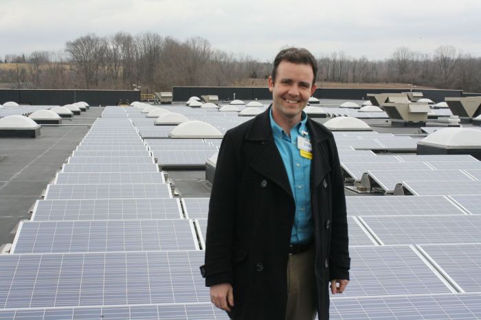 Walmart store manager Stan Miller with the recently completed PV installation in Ohio