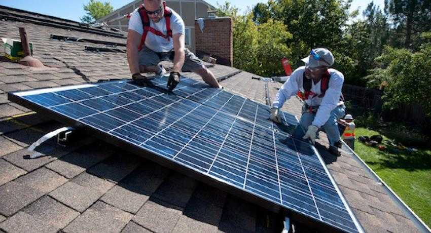 REC installing solar on home